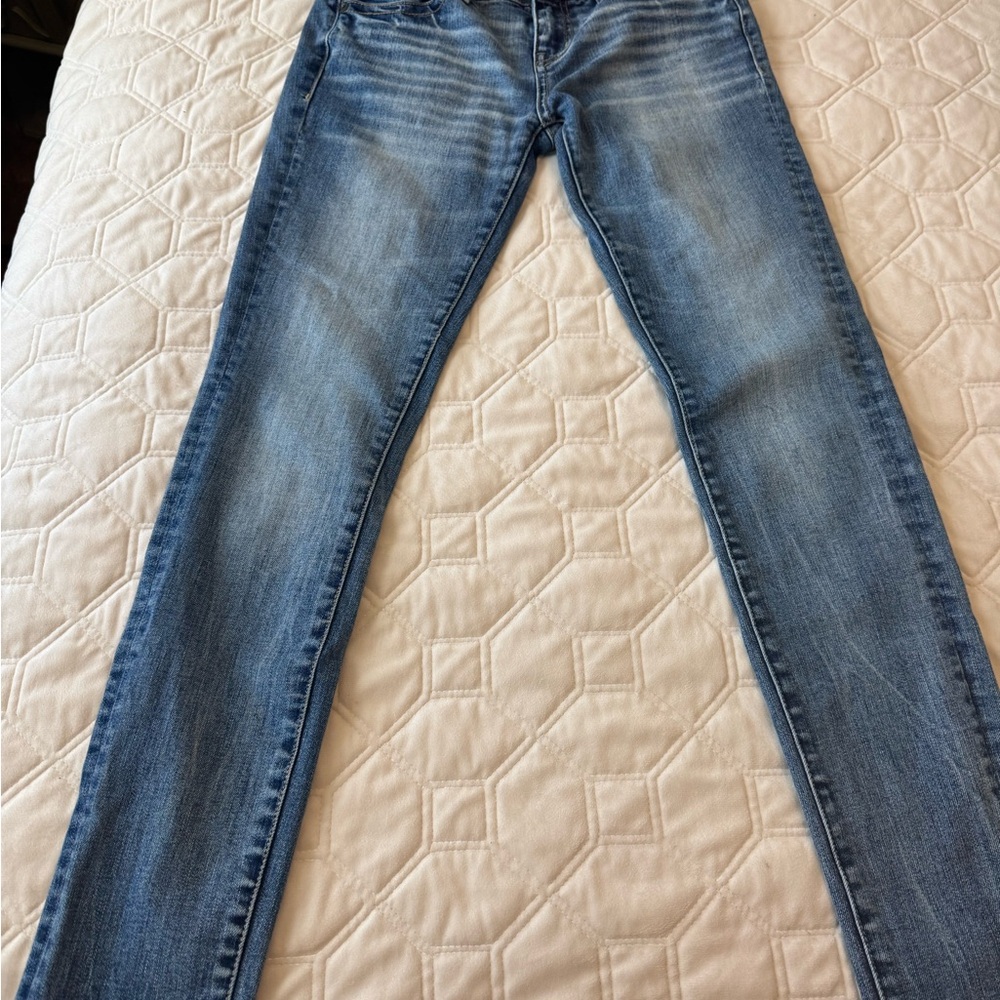 Buckle Black Skinny Jeans.